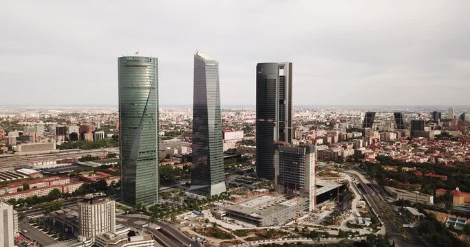MADRID, SPAIN - JUNE 16, 2019: Aerial cityscape of Madrid with four modern business skyscrapers Cuatro Torres