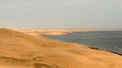 Fototapeta na wymiar The Atlantic Ocean and the Namib Desert joining together in harmony