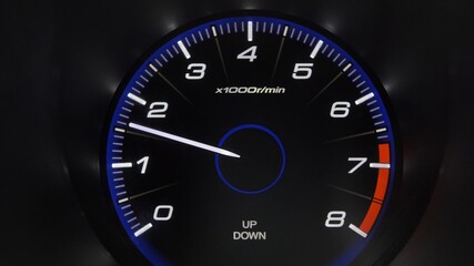 Tachometer Gauge of Starting and Stopping Car Close Up