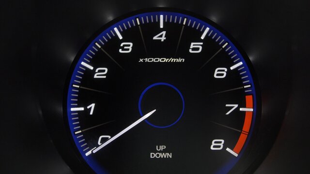 Tachometer Gauge of Starting and Stopping Car Close Up