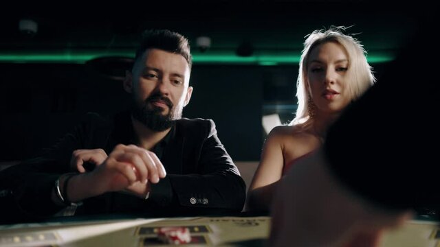 People playing poker in casino