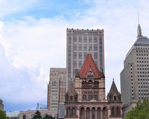 Fototapeta na wymiar Boston Street View Trinity Church and Its Neighbor Modern High Buildings 