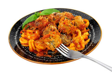 Beef and pork meatballs Al Forno with trulli pasta in tomato sauce meal isolated on a white background