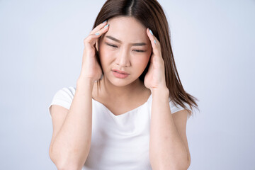Fototapeta premium Asian woman suffering from headache, Isolated on a white background.