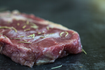 Fresh beef steak sliced on a background