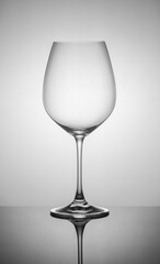 .empty drink glasses on dark background with back light