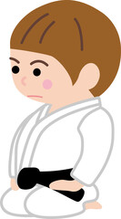 道着を着て正座をする男の子
