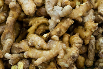 Ginger root counter at grocery store close up