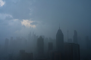 Fototapeta na wymiar Heavy fog landscape of Kuala Lumpur city center
