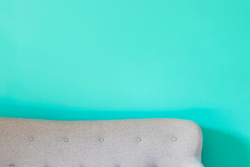 Obraz na płótnie Canvas Canapé avec mur turquoise