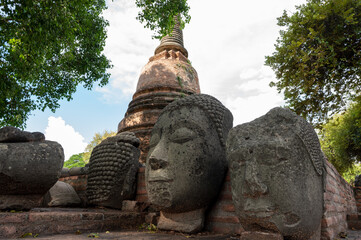 Ayutthaya / Thailand / August 8, 2020 : Wat Ratchaburana, Ancient Buddhist temple remains with elaborate carvings & a restored tower & tomb.