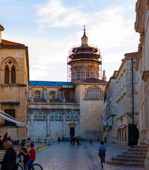 Dubrovnik Croatia November 2020 Town square are in front of the big church in the old city of Dubrovnik, people walking by and children playing in the streets