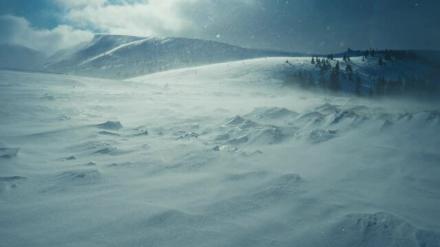Snow storm mountains strong wind winter arctic weather