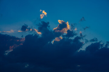 Heavy cloudy sky at sunset. A landscape of beautiful nature