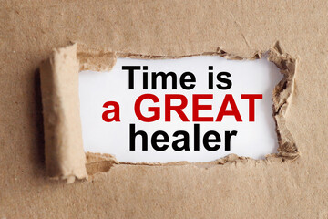 TIME IS A GREAT HEALER TEXT, text on white paper with torn paper background