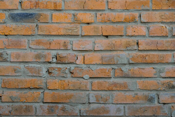 Orange brick wall. Copy space.