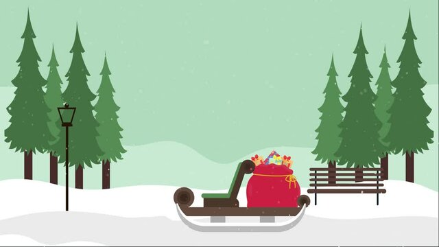 Sledge with bag of Christmas gifts under snowfall