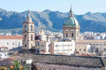 Urban landscape of Palermo the main city of Sicily in Italy. Here the roof and of the old houses with the mountains in the background seen from the St. Catherine's Monastery terraces