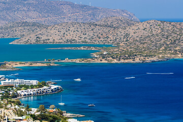 Beautiful clear ocean and resorts in the town of Elounda, Crete, Greece