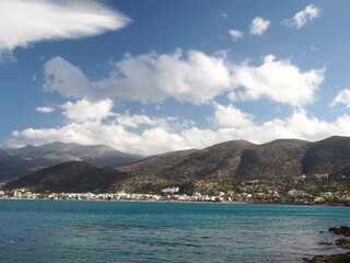 Views of the Mediterranean Sea, mountains and coastal houses in Crete island