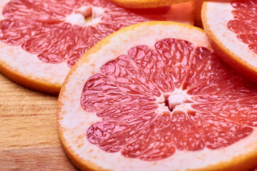 sliced juicy red grapefruit close up