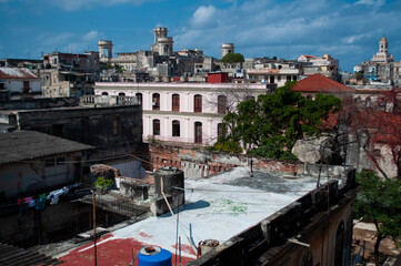 Fototapeta na wymiar Aerial panoramic view of an old and destroyed city where there are houses and people live. Havana
