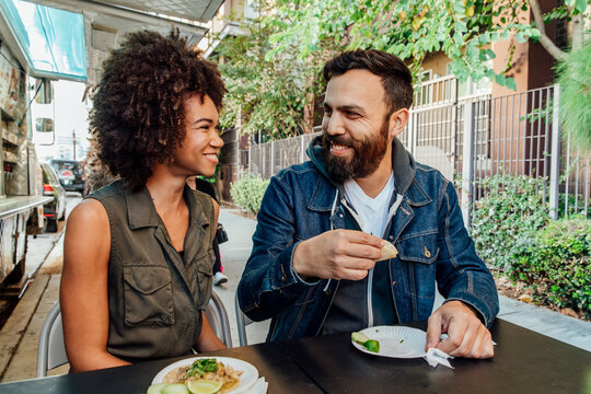 Couple With Street Tacos - Powered by Adobe
