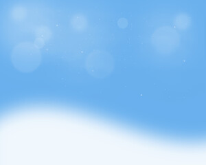 Zimowe niebieskie mroźne niebo z delikatnymi płatkami śniegu i śnieżnym puchem