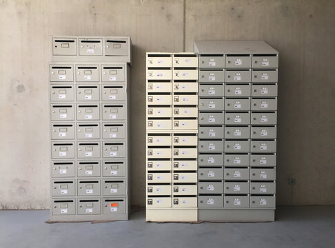 three piles of mailboxes