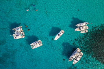Aerial view of a few boats on the sea. Comino island, Blue lagoon. Malta