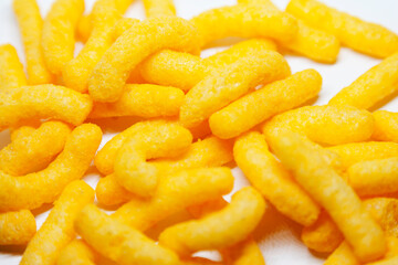 lots of cheese arches lying on a white background