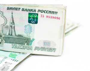 Scattered Russian 1000 rubles banknotes closeup