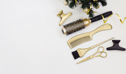 Banner with hairdressing tools in gold color and a Christmas tree on a white background. Holiday...