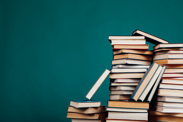 many stacks of educational books to study in the university library as a background