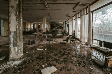 Interior of abandoned building with wet floor