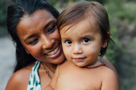 Portrait of happy mother and child