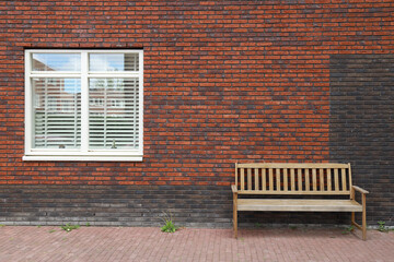 brick wall and bench