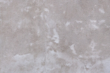 the texture of the concrete wall is uniform under soft light