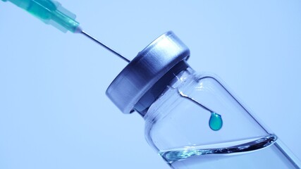 Medical scientist mix vaccine in the vile. Lab developing research of vaccine against Coronavirus,...