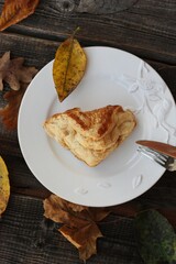 Delicious pastry croissant in a white plate 
