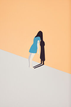 Young woman leaning against the wall