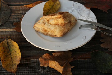 Delicious pastry croissant in a white plate 