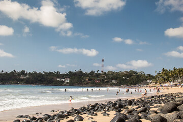 Obraz premium Sea ​​and rocks beach scene, natural landscape, summer sunny day for vacation, water sweep, beach wallpaper