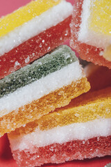 Multi-colored marmalade jelly candy's. Heap of colorful marmalade candy close-up. Macro shot, selective focus.