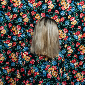 Girl with matching shirt and background.