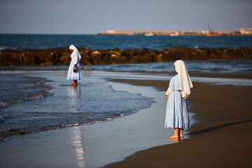 nun on the beach