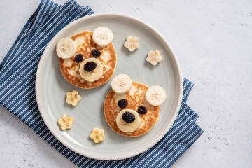 Kids breakfast pancakes with funny bear face