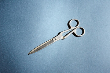 scissors on a blue background
