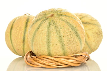  fragrant organic melons, close-up, on a white background.