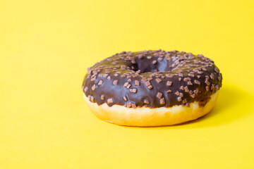 Colorful delicious donuts with sugar glaze on top